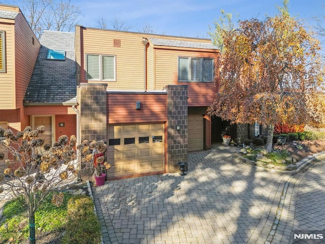 view of front of property featuring a garage