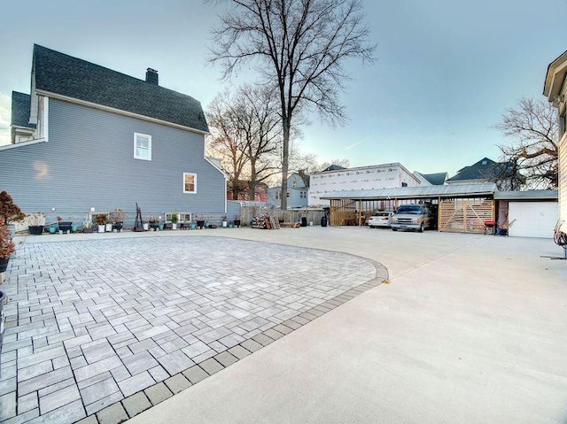 view of patio / terrace with a carport