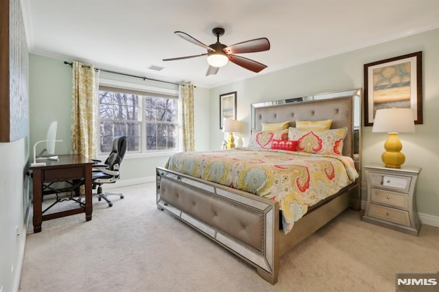 bedroom with ceiling fan and light colored carpet