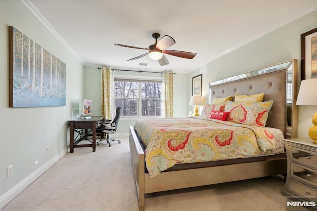 bedroom with ceiling fan, crown molding, and light carpet