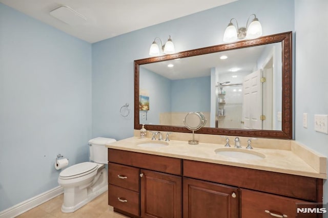 bathroom featuring tile patterned flooring, an enclosed shower, vanity, and toilet