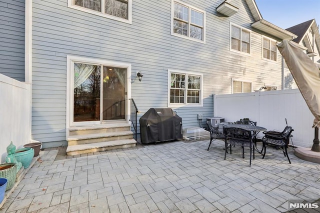 view of patio with a grill