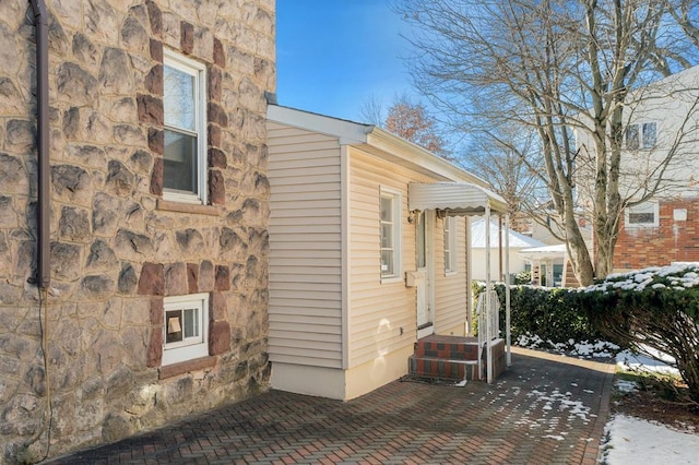 view of home's exterior featuring a patio area