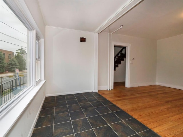 unfurnished room featuring dark wood-type flooring