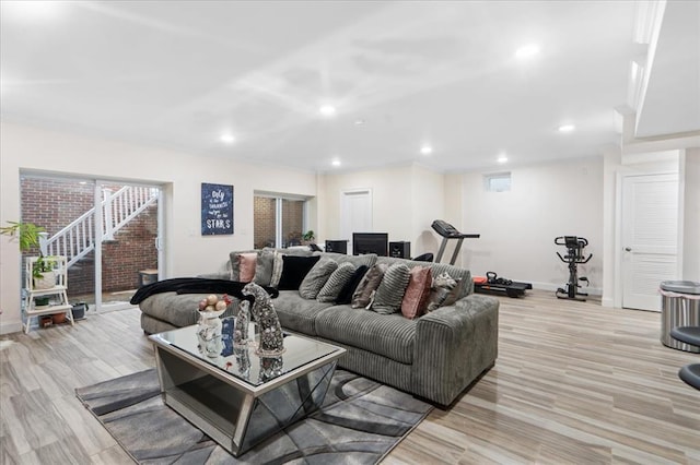 living room with light hardwood / wood-style flooring