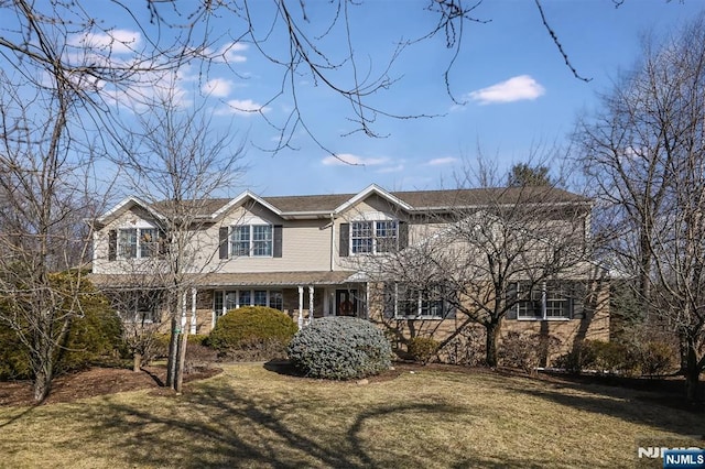 view of front of home with a front yard