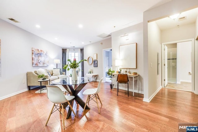 dining area featuring light hardwood / wood-style floors