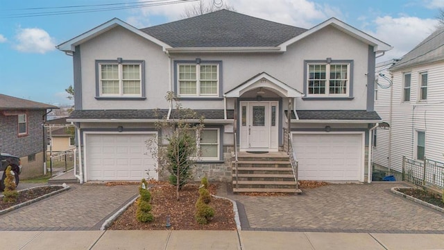 view of front of home with a garage