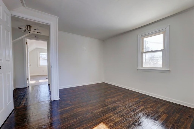 unfurnished room with dark hardwood / wood-style floors