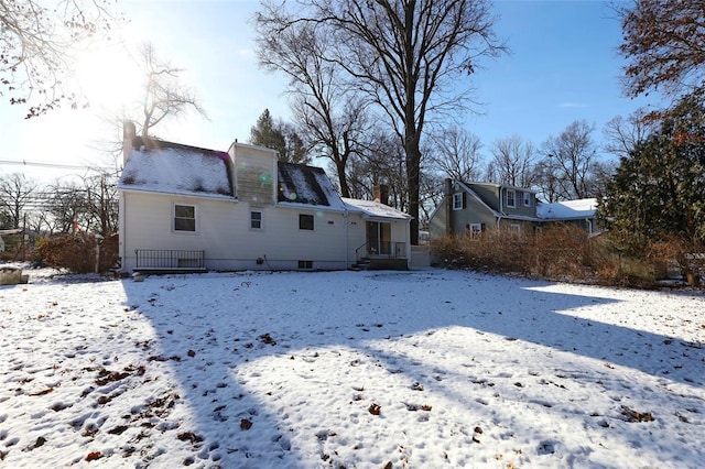 view of snow covered property