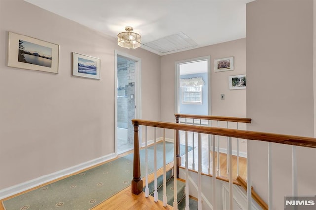 hallway with light wood-type flooring