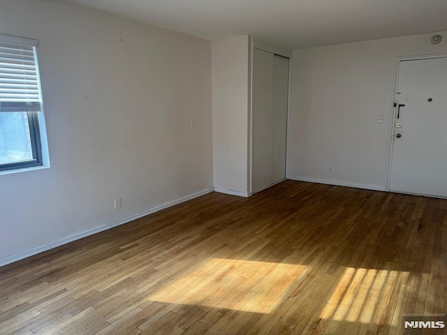 empty room featuring light wood-type flooring