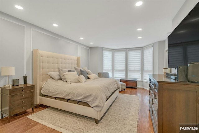 bedroom featuring light hardwood / wood-style flooring