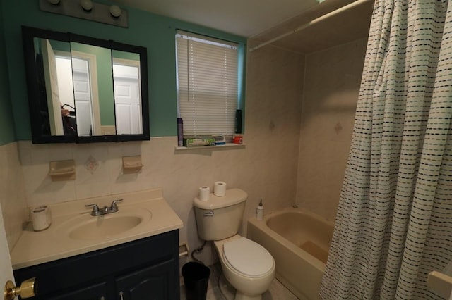 full bathroom featuring vanity, decorative backsplash, toilet, shower / bath combo with shower curtain, and tile walls