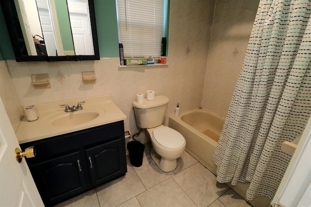 full bathroom featuring vanity, tile patterned floors, toilet, shower / bathtub combination with curtain, and tile walls