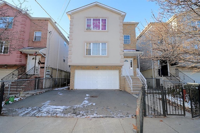 view of front of property featuring a garage