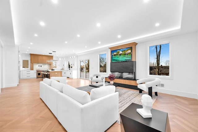 living room with light parquet floors