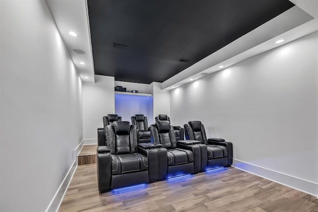 home theater featuring light hardwood / wood-style flooring