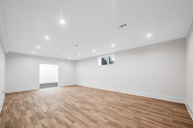 empty room with light wood-type flooring