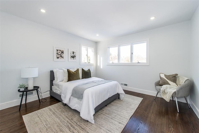 bedroom featuring dark wood-type flooring