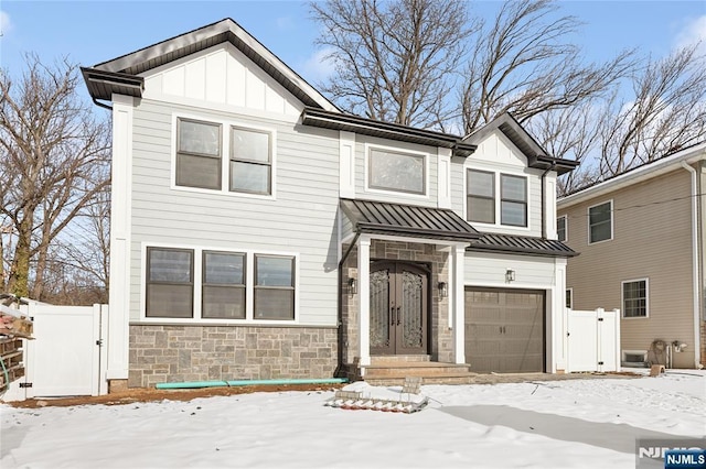 view of front of home with a garage