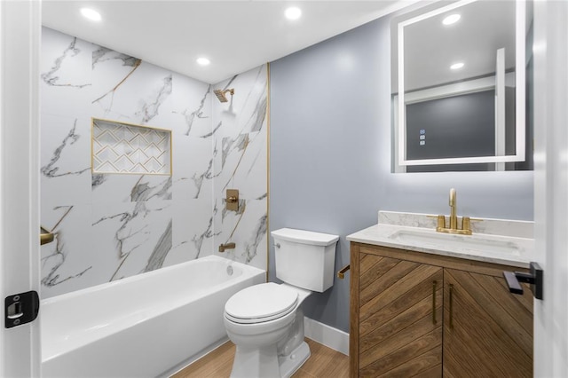 full bathroom with bathing tub / shower combination, recessed lighting, toilet, vanity, and wood finished floors