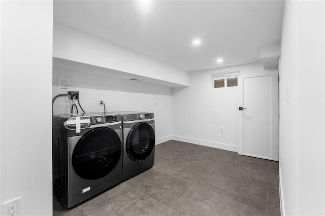 laundry area featuring laundry area, baseboards, washer and clothes dryer, and recessed lighting