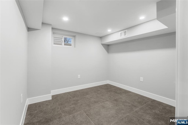 basement featuring recessed lighting, visible vents, and baseboards