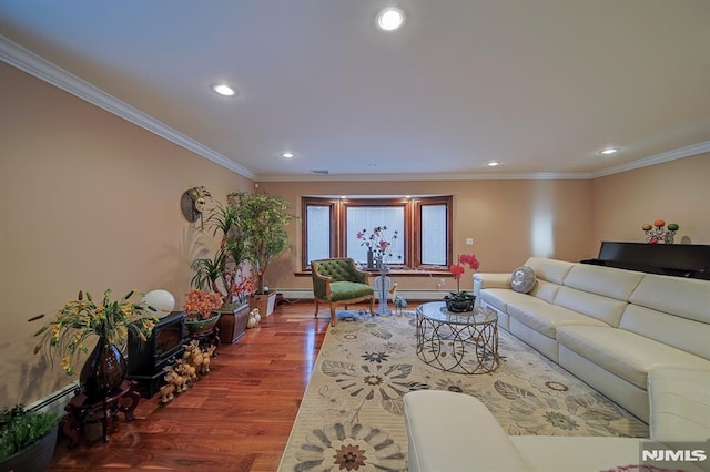 living room featuring wood-type flooring, ornamental molding, and baseboard heating