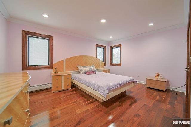 bedroom with baseboard heating, crown molding, and dark hardwood / wood-style flooring