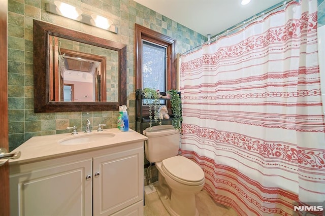 bathroom featuring vanity, a shower with curtain, decorative backsplash, toilet, and tile walls