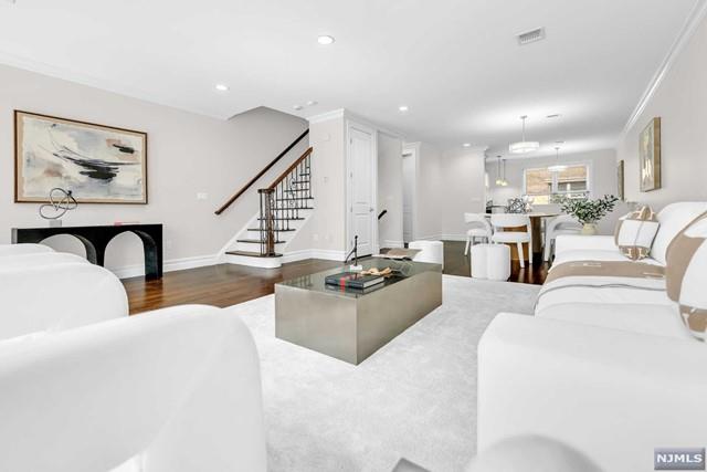 living room featuring dark hardwood / wood-style flooring