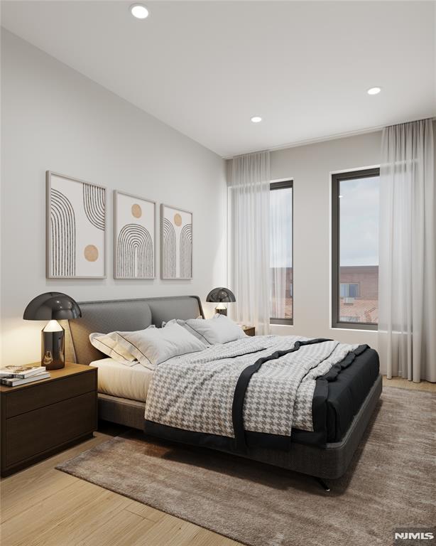 bedroom featuring light hardwood / wood-style floors