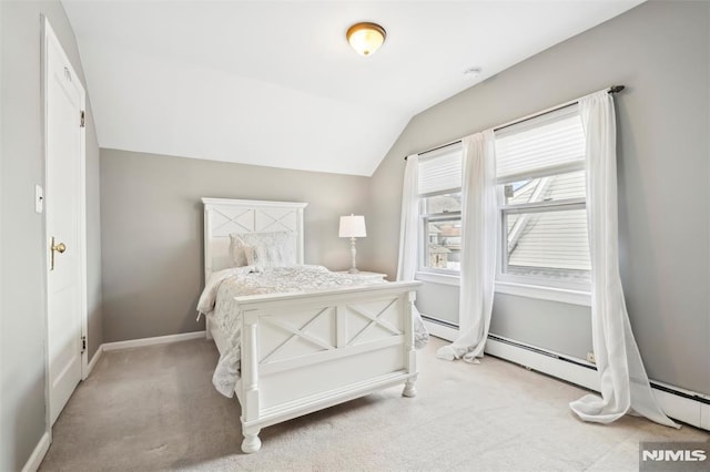 bedroom with light carpet and vaulted ceiling