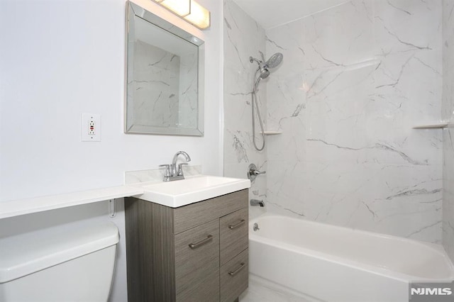 full bathroom with vanity, bathtub / shower combination, and toilet