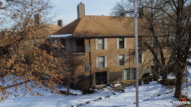 view of snow covered property