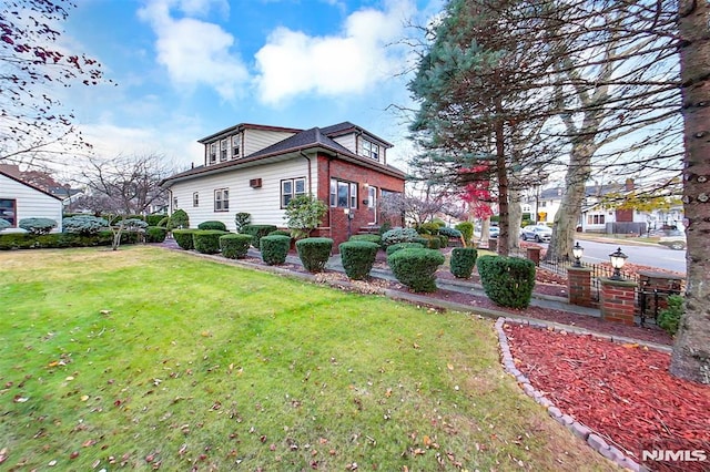 view of home's exterior featuring a yard