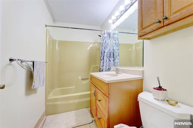 full bathroom featuring vanity, toilet, and shower / bath combo with shower curtain