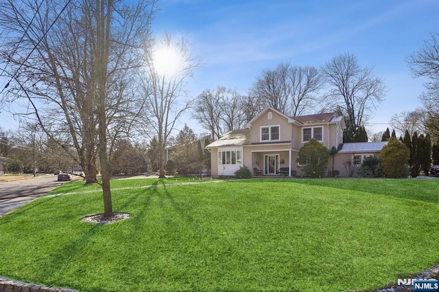 front of property featuring a front lawn