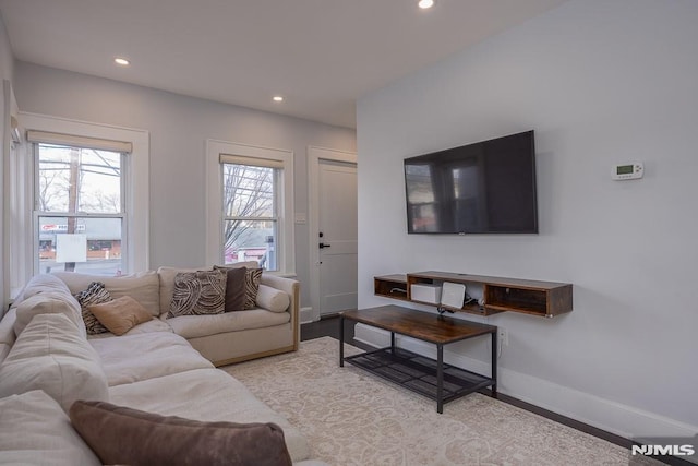 living room with light hardwood / wood-style floors