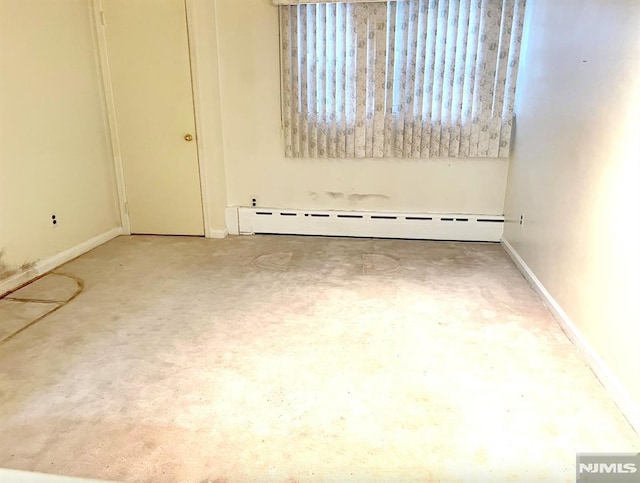 empty room with a baseboard radiator