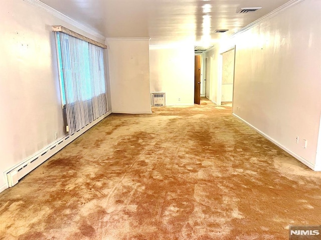 spare room with carpet flooring, crown molding, radiator, and a baseboard radiator