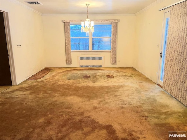 unfurnished room with a chandelier, carpet, radiator, and crown molding