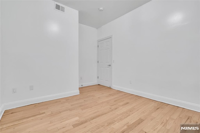 empty room featuring light hardwood / wood-style flooring