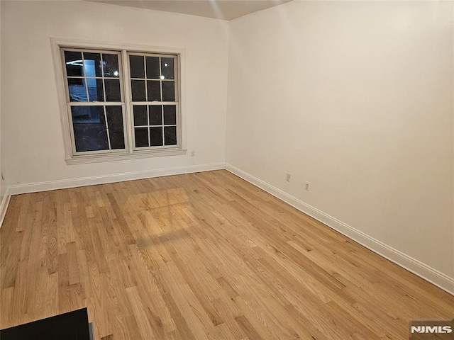 empty room featuring light wood-type flooring