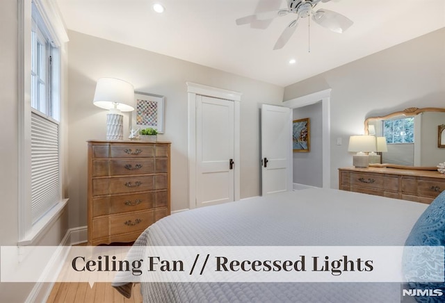 bedroom featuring ceiling fan and multiple windows