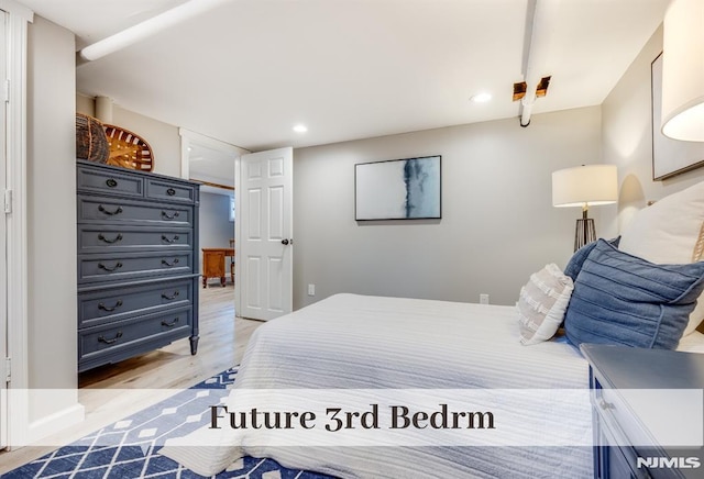 bedroom featuring light wood-type flooring