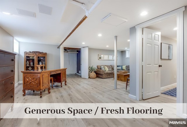 office area with light wood-type flooring