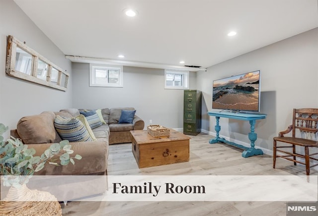 living room with light hardwood / wood-style floors