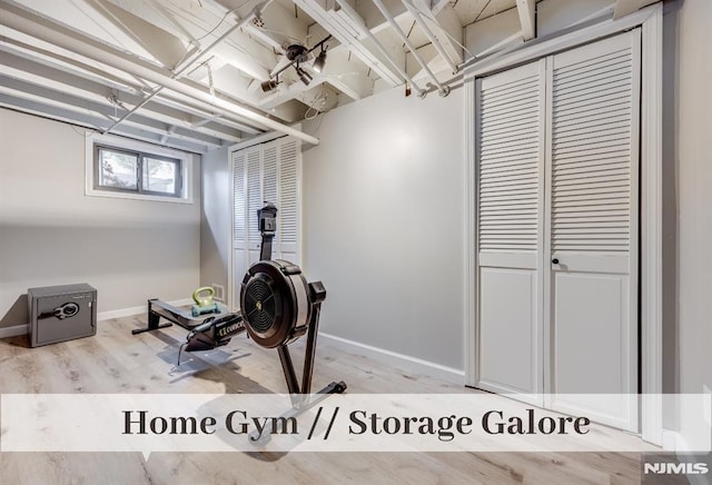 exercise area featuring light hardwood / wood-style flooring